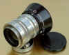 Nikkor50-1.4-S.C.317956side+hood2.jpg.jpg (74187 byte)